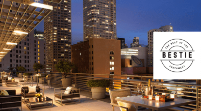 Four Seasons Hotel San Francisco patio overlooking Market Street buildings.