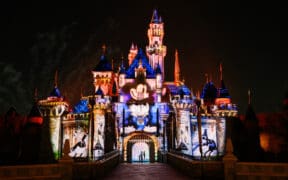“Wondrous Journeys,” nighttime event shows an image of Mickey Mouse projected onto the Sleeping Beauty Castle at Disneyland.