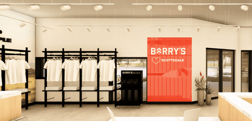 The interior of Barry's in Scottsdale with white t-shirts and front-desk check-in.