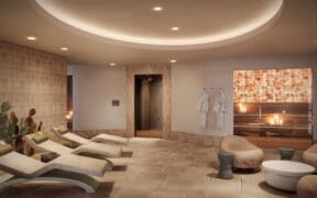 Several spa loungers line the wall of The Spa at Camelback Inn at the relaxation room of JW Marriott Scottsdale Camelback Inn Resort & Spa.