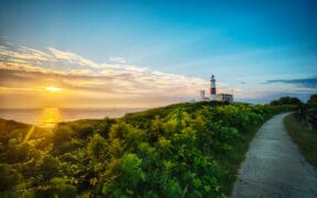 The Montauk Lighthouse Point at sunset in Montauk, New York.