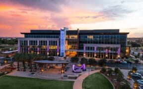 An evening view of GSQ shopping area and City Hall in Goodyear.