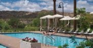 The new Rancho de Los Caballeros with cabanas and mountain views in the background.