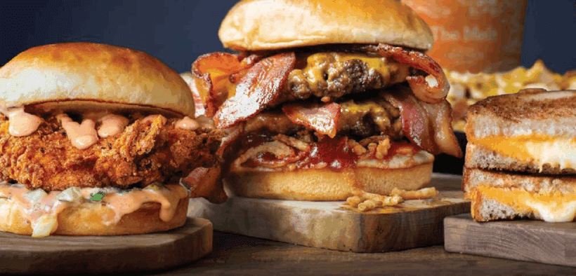 A chicken melt, bacon cheeseburger melt, grilled chees and to-go drink from The Melt at Novus Innovation Corridor.