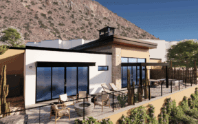 A photo rendering of the outside facade of The Canyon Suites at The Phoenician, a Luxury Collection Resort, with mountains in the background.