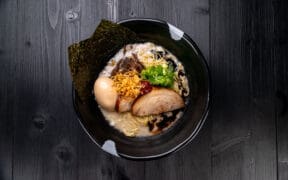 A bowl of ramen with pork, veggies and noodles from JINYA Ramen Bar at Trailhead in Peoria, Arizona.