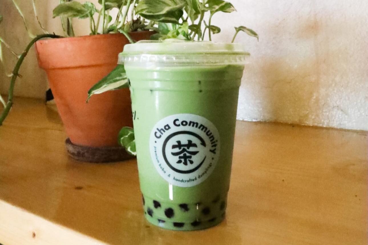 Green matcha milk tea with tapioca pearls from Cha Community café in Waco, Texas.