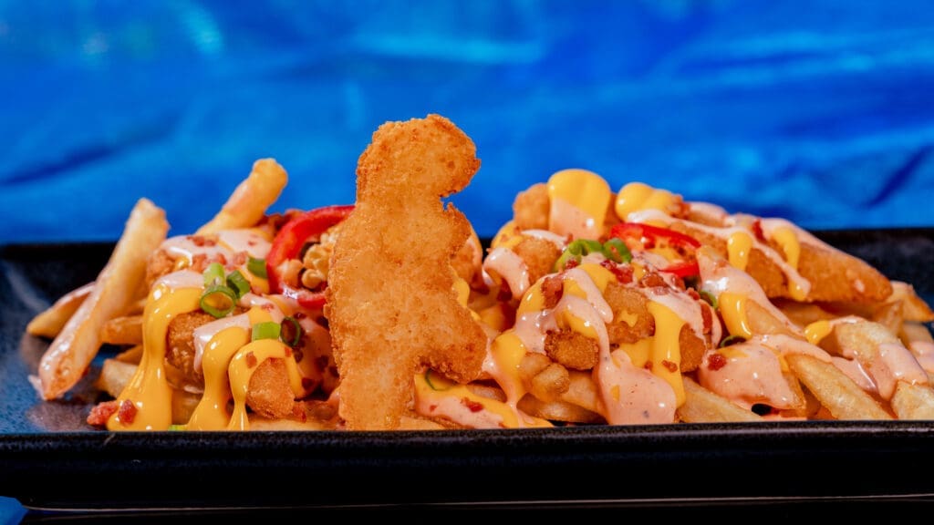 Loaded Dino Nuggets topped with sauces and garnishes served during Disneyland After Dark Disney Channel Nite
