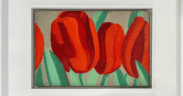 Alex Katz painting “Red Tulips” (1967) featuring vivid red tulip blooms with green leaves in a minimalist composition, exhibited at Scottsdale Art Week 2026 in Scottsdale, Arizona.
