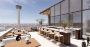Rooftop bar and dining terrace at Aleteo at The Monarch San Antonio, featuring city views, modern seating and an open-air bar overlooking downtown.