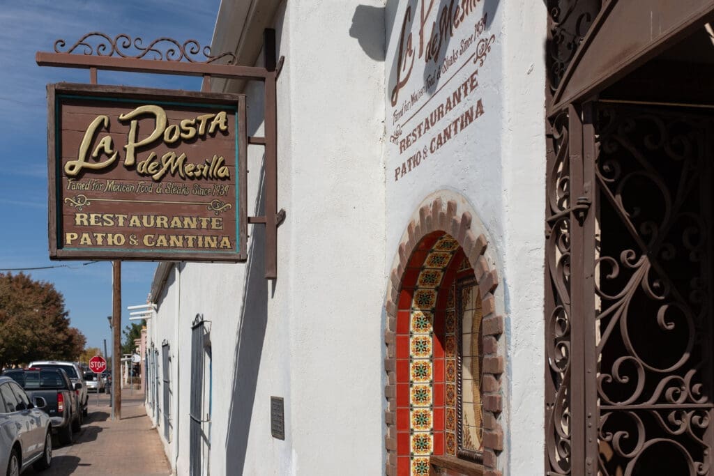 La Posta de Mesilla restaurant exterior with traditional signage and adobe architecture in Mesilla, New Mexico.