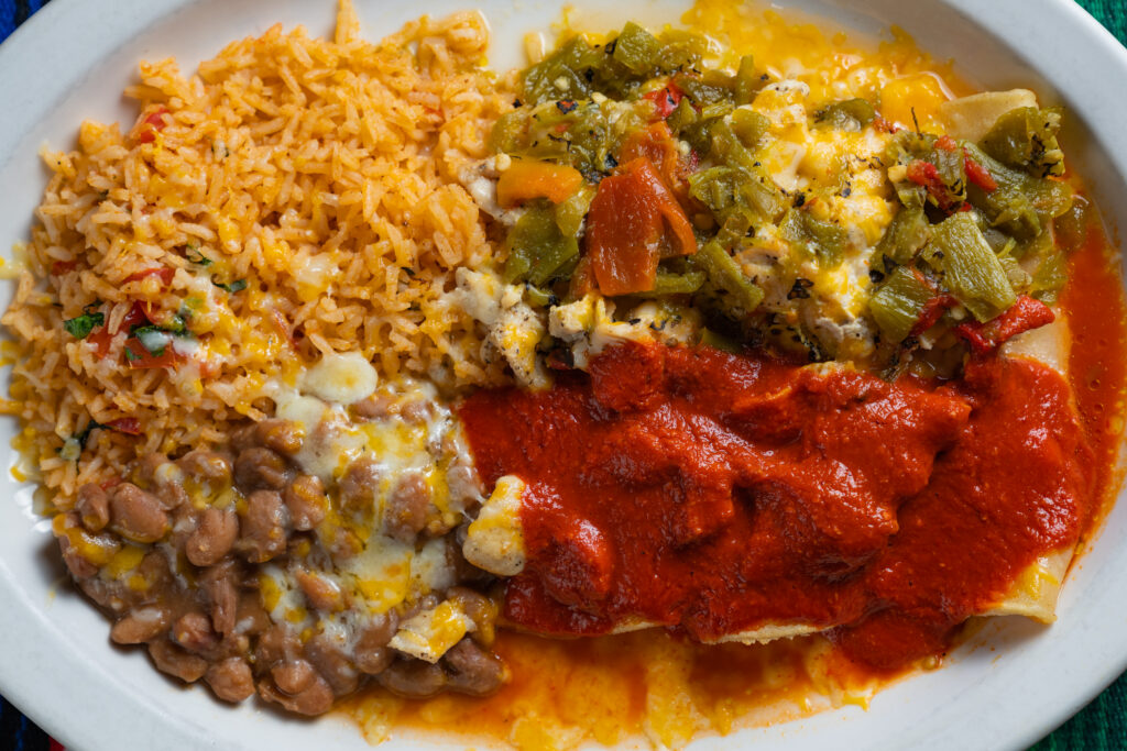 New Mexico green chile enchiladas with rice and beans at Frank & Lupe’s Scottsdale restaurant.