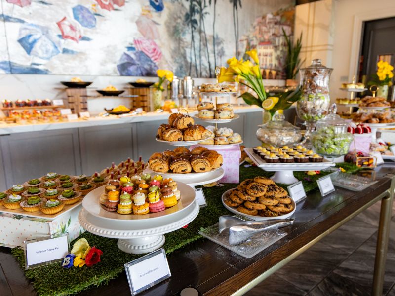 A full dessert buffet with different pastries and desserts at Waldorf Astoria Monarch Beach Resort .