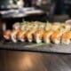 The Akira roll at Across the Pond combines spicy salmon, tamarind sauce and a garlic crumble.