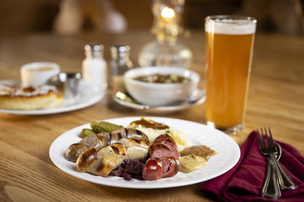 German sausages, sides and beer served at The Bavarian restaurant in Taos Ski Valley.