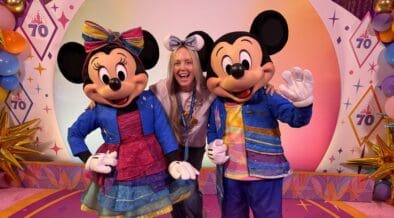 Erin Thorburn poses with Mickey Mouse and Minnie Mouse during Disneyland Resort's Kids Rule Summer media event at Disneyland Resort in Anaheim, California.