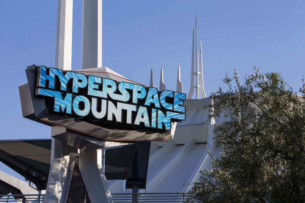 Hyperspace Mountain attraction sign at Disneyland’s Tomorrowland, featuring a Star-Wars-themed overlay of Space Mountain.