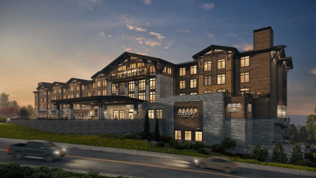 Exterior rendering of Canopy by Hilton Deer Valley in Park City with mountain-inspired architecture.