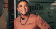 Chef Marc Quiñones smiles while standing inside La Fonda on the Plaza in Santa Fe, New Mexico.