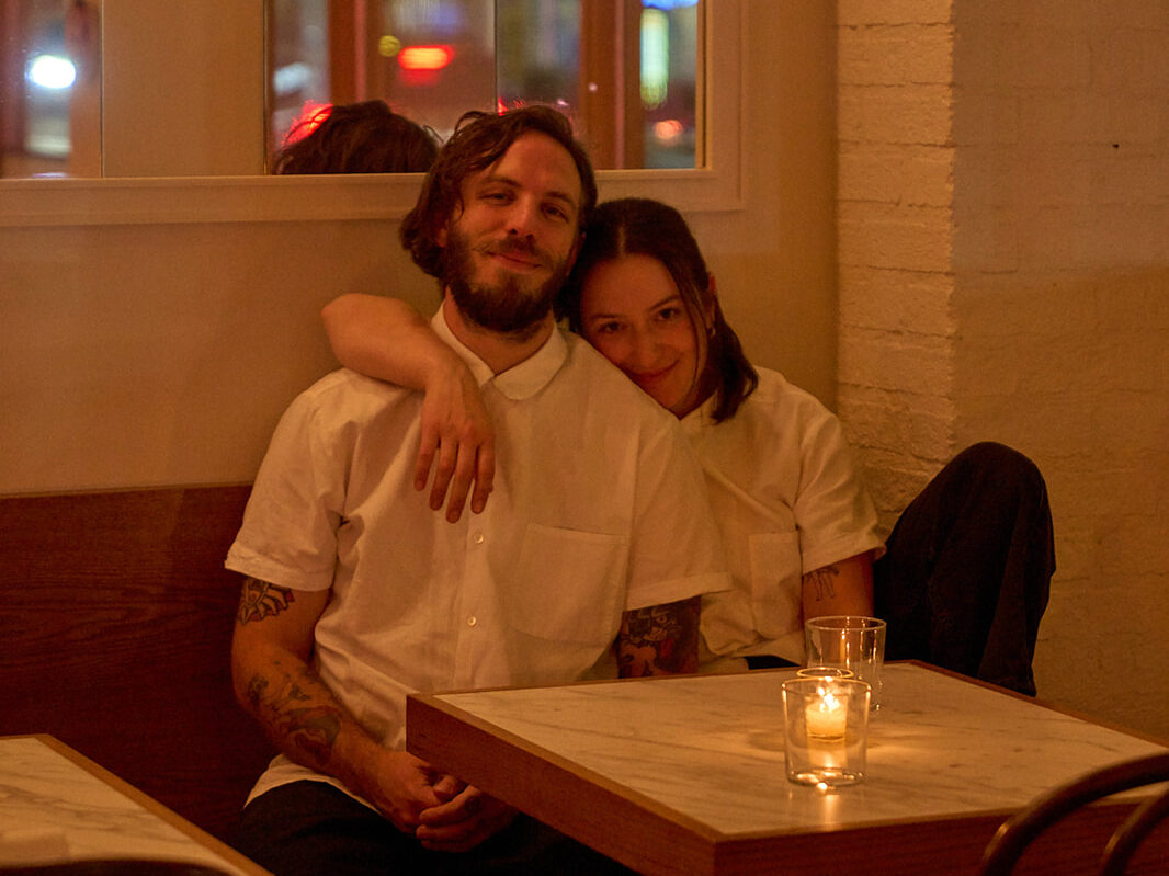 Chefs Anna Sonenshein and Niki Vahle sit together inside Little Fish Melrose Hill restaurant in Los Angeles.