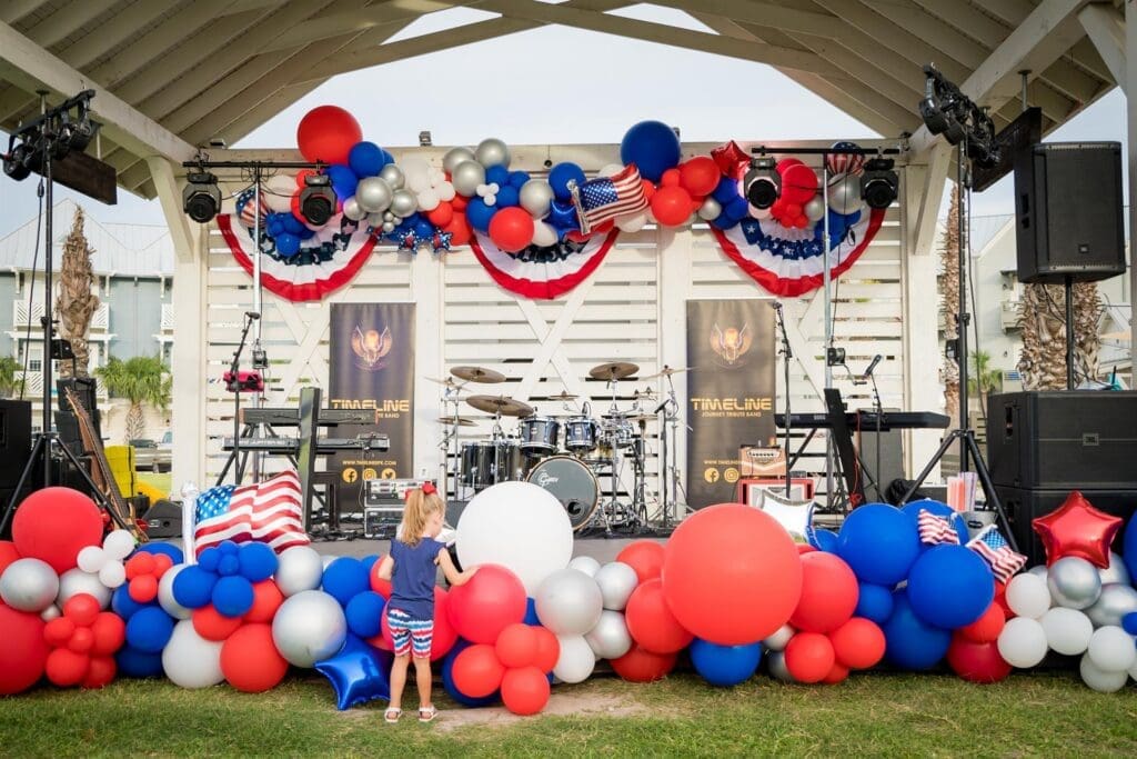 Patriotically decorated stage during Cinnamon Shore's Red, White & Beach Fourth of July celebration in Port Aransas, Texas.