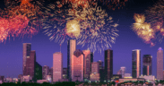 Fireworks burst above the Houston skyline during the Freedom Over Texas Independence Day celebration.