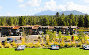 Village Camp Flagstaff cabins with forest and mountain views near Flagstaff, Arizona.