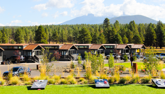 Village Camp Flagstaff cabins with forest and mountain views near Flagstaff, Arizona.