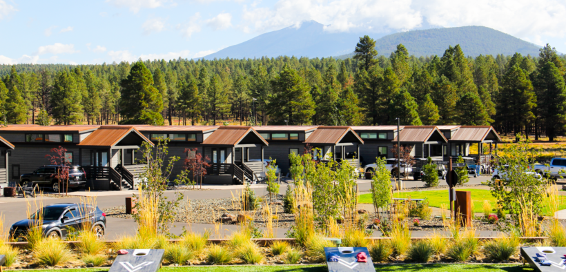 Village Camp Flagstaff cabins with forest and mountain views near Flagstaff, Arizona.