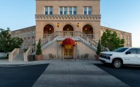 Front entrance of the historic Hotel Parq Central boutique hotel in Albuquerque, New Mexico.