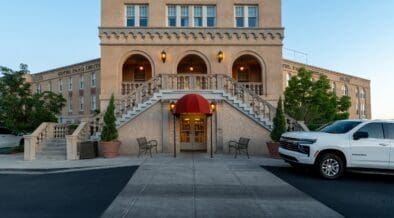 Front entrance of the historic Hotel Parq Central boutique hotel in Albuquerque, New Mexico.