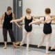 Ballet instructor teaching young dancers during class at The School of Ballet Arizona's North Central Phoenix campus.