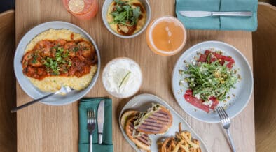 Seasonal dishes, cocktails and handcrafted beverages on a table at CAYA restaurant in Edwards, Colorado.