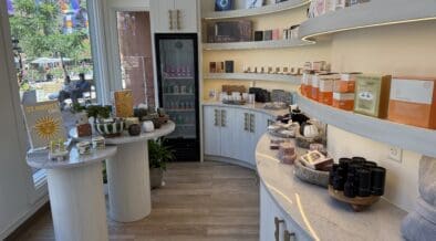 Boutique retail area inside Sway Wellness Spa in Denver's Larimer Square featuring skincare products and wellness items.