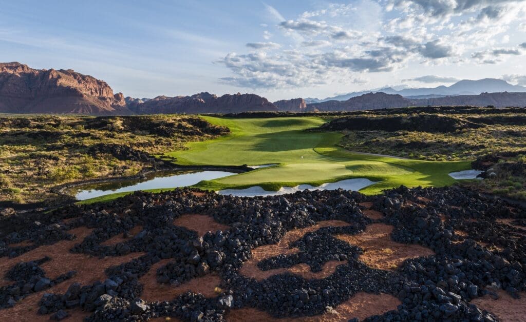 Greater Zion mountains with Black Desert Rose Resort's golf course and black lava fields.