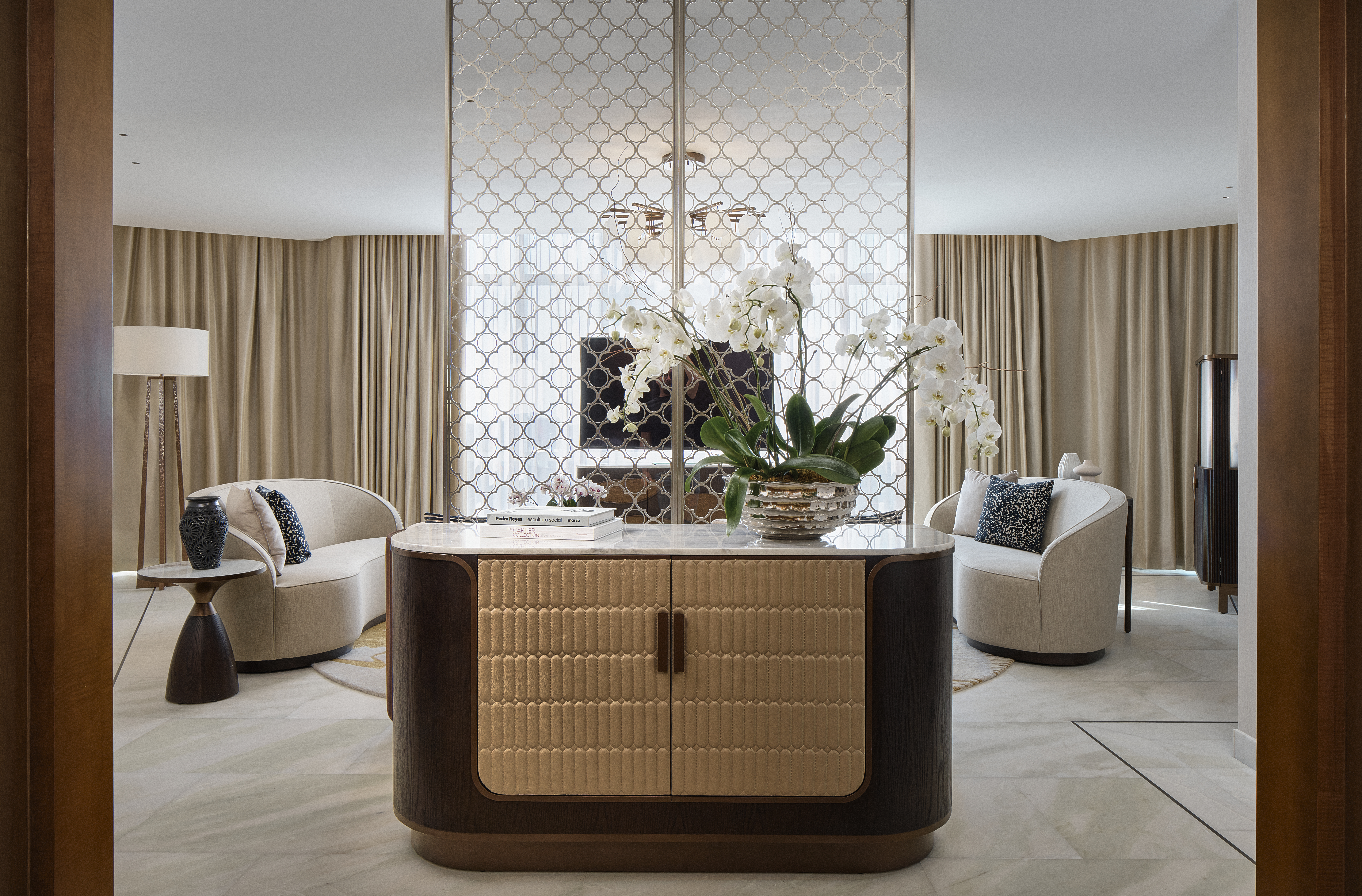 Astor Suite interior with custom furnishings, orchids and decorative screens at The St. Regis Mexico City.