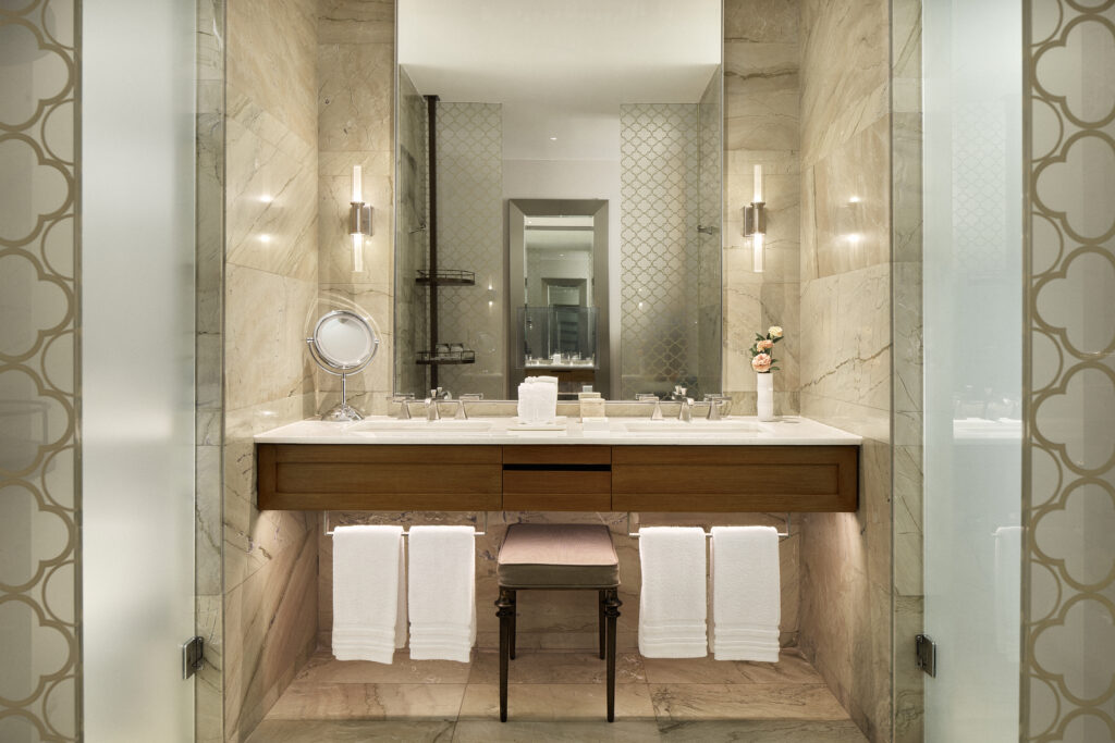Renovated marble bathroom with double vanity at The St. Regis Mexico City.