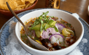 Red snapper ceviche with avocado, red onion and herbs served over ice at Tamayo in Denver.