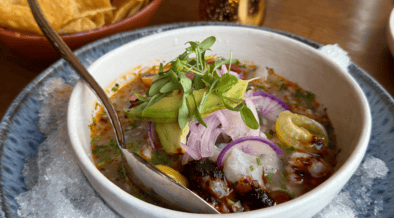 Red snapper ceviche with avocado, red onion and herbs served over ice at Tamayo in Denver.