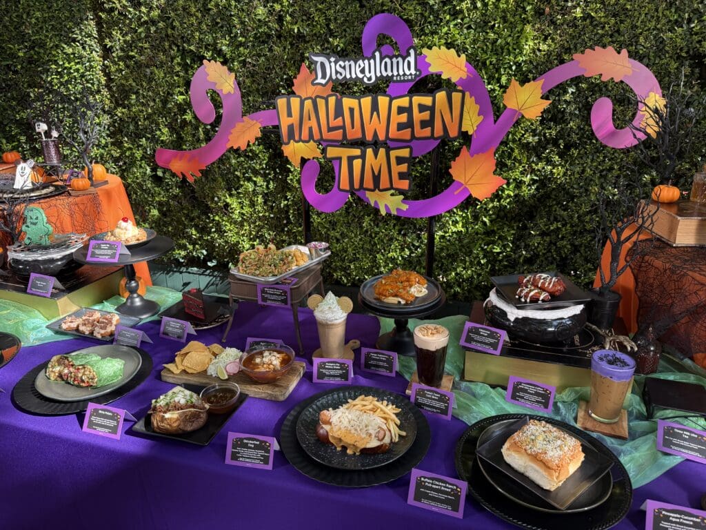 Halloween Time food and drinks displayed beneath a Disneyland Resort Halloween Time sign.