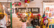 Colorful flowers, a longhorn skull and Flower Bar display inside Junk Gypsy in Round Top, Texas.