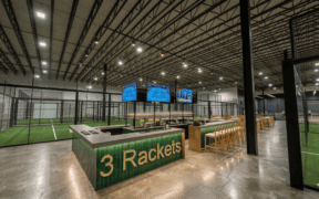 Rendering of the central bar surrounded by indoor courts at Three Rackets in Broomfield, Colorado.