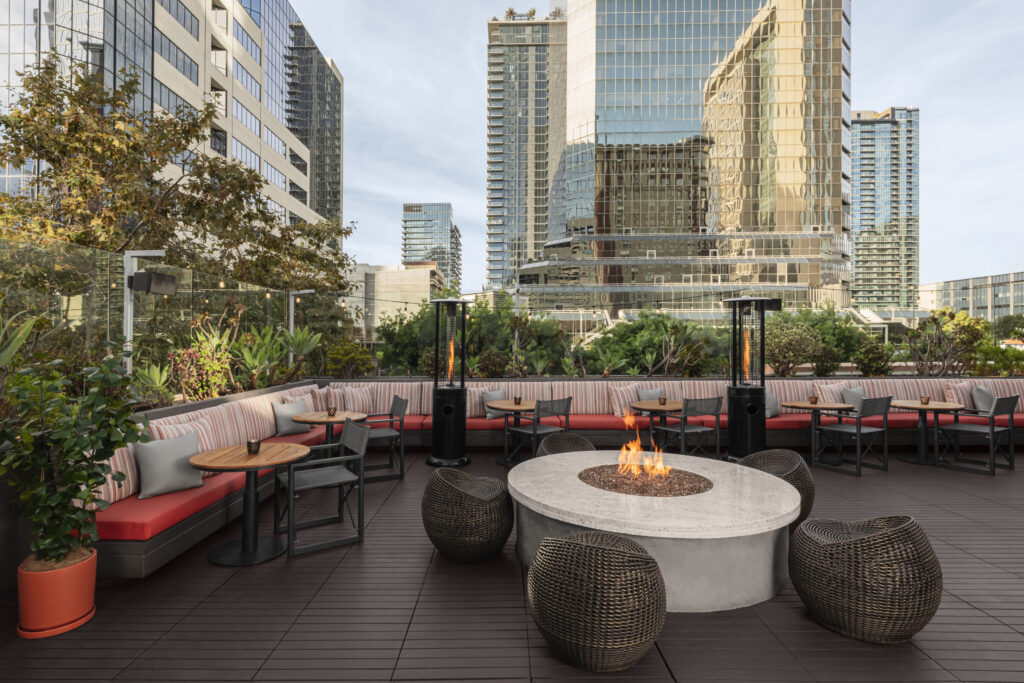 Topside Terrace rooftop seating and firepit overlooking downtown San Diego.