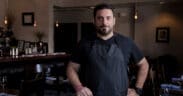 Chef Gio Osso standing inside Virtù Honest Craft in Scottsdale.