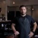 Chef Gio Osso standing inside Virtù Honest Craft in Scottsdale.