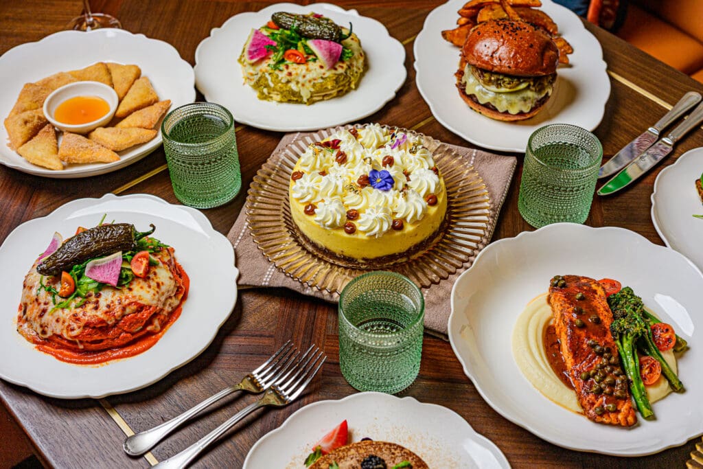 Spread of entrées, appetizers and dessert at Millie Leigh’s in Midland, Texas.