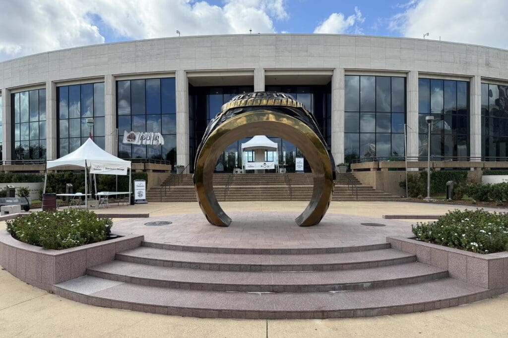Large Aggie Ring sculpture outside a Texas A&M University building in College Station.